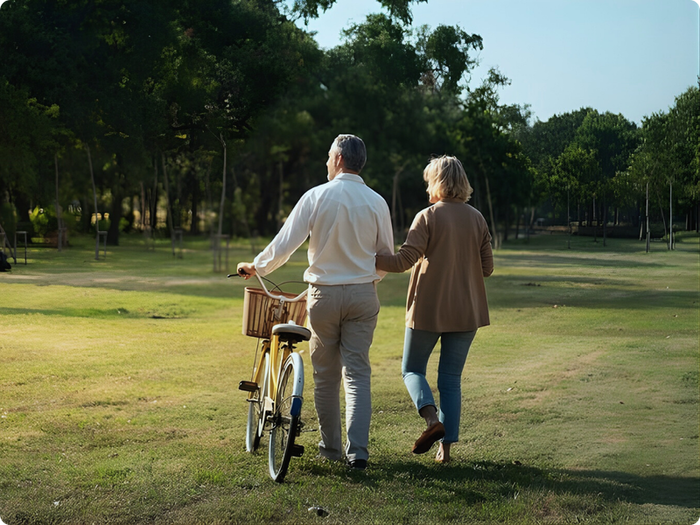 Couple in park with bike
