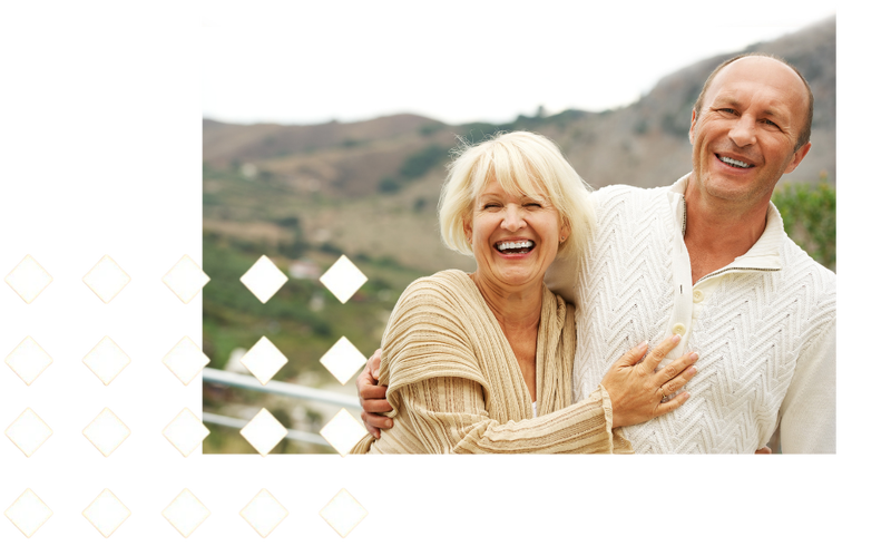 Couple smiling outside your legacy page