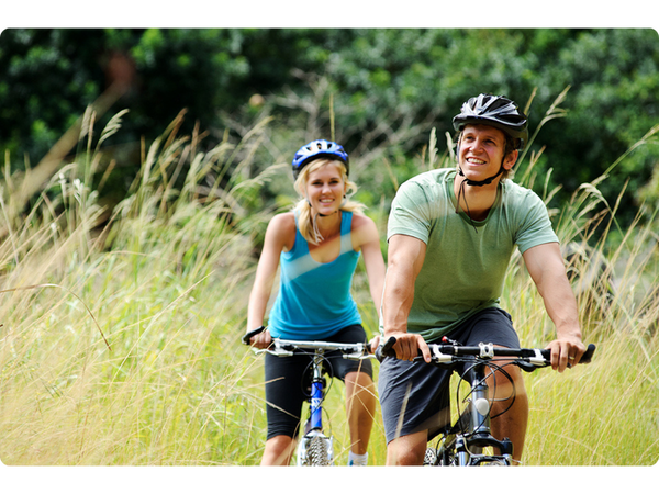 Couple biking your legacy image